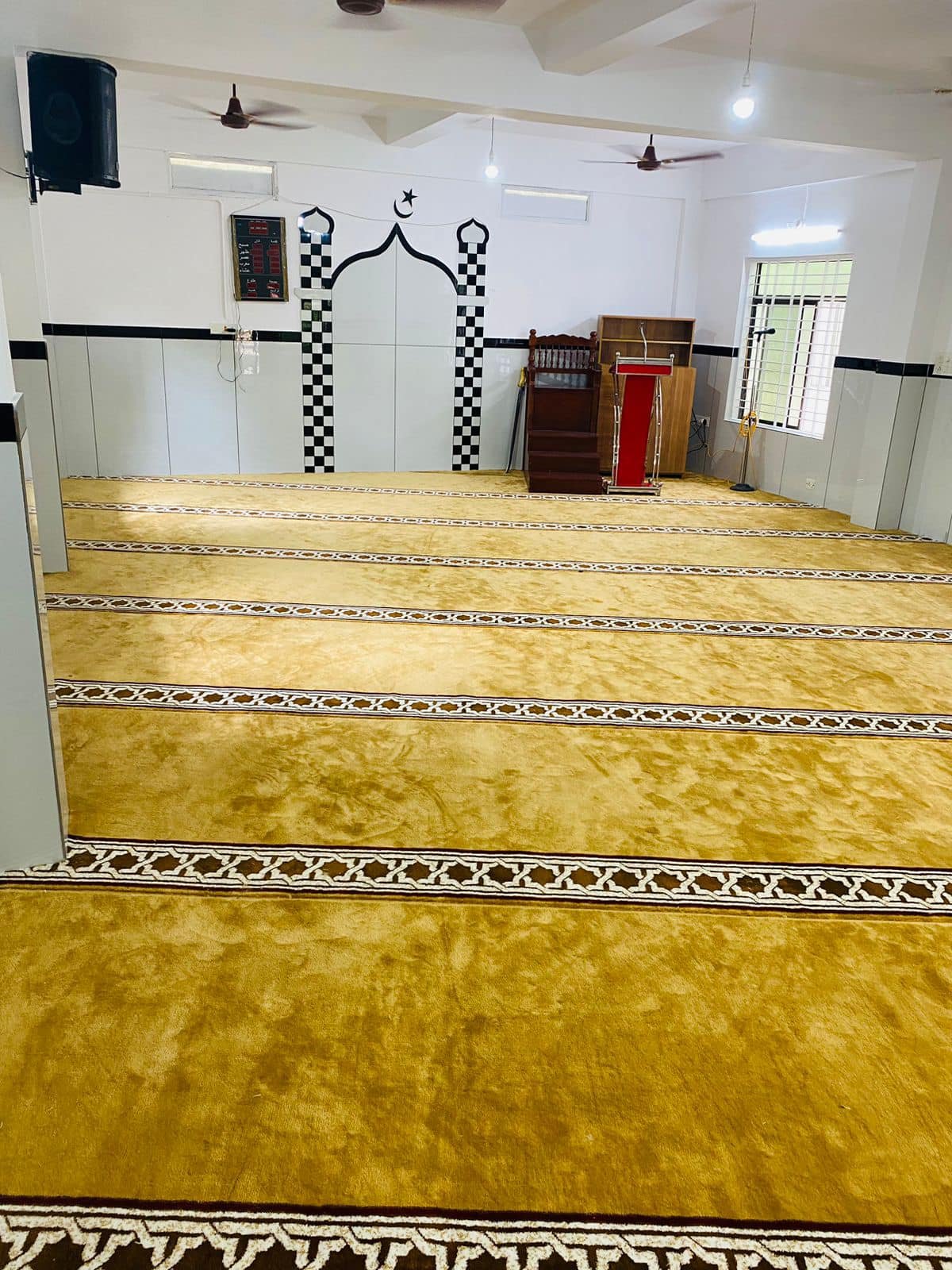 Soft and durable masjid carpet covering the entire prayer area in Kasargod